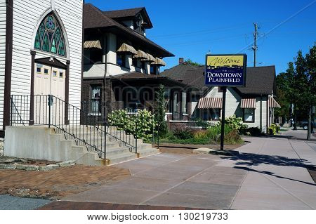 PLAINFIELD, ILLINOIS / UNITED STATES - SEPTEMBER 20, 2015: A sign in front of the former St Mary's Catholic Church welcomes visitors to downtown Plainfield.