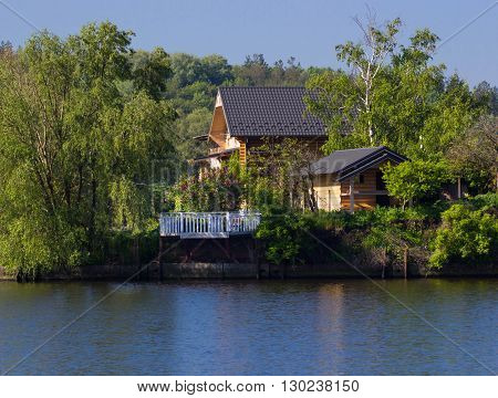 Beautiful wooden house near the river Dniepr