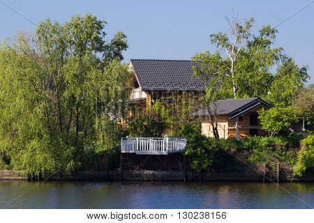 Beautiful wooden house near the river Dniepr