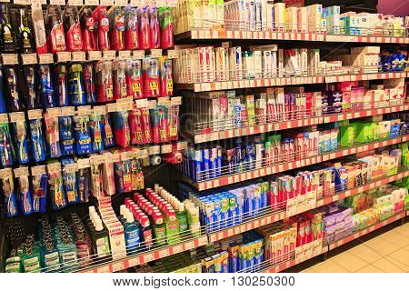 Chernihiv / Ukraine. 06 March 2016:different kinds of toothpaste and brushes and other hygiene products with wide assortment on the shelves of supermarket. 06 March 2016 in Chernihiv / Ukraine.