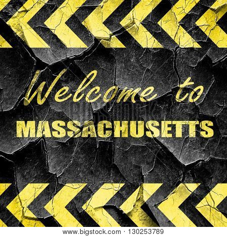 Welcome to masschusetts, black and yellow rough hazard stripes