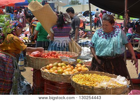 QUETZALTENANGO GUATEMALA april 28 2016 : Woman sale fruits in Quetzaltenango maket. This native market is the most colorful in Central America