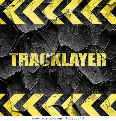 tracklayer, black and yellow rough hazard stripes