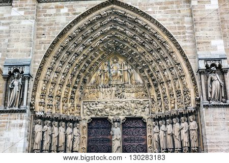 Judgement Door Biblical Statues Notre Dame Cathedral Paris France. Notre Dame was built between 1163 and 1250AD.