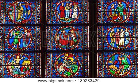 PARIS, FRANCE - MAY 31, 2015 Kings Saints Medieval Stories Stained Glass Notre Dame Cathedral Paris France. Notre Dame was built between 1163 and 1250AD.