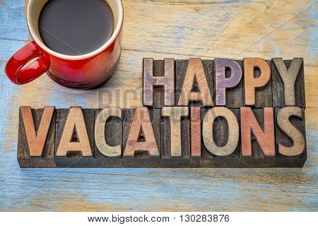 Happy vacations  banner in vintage letterpress wood type with a cup of coffee