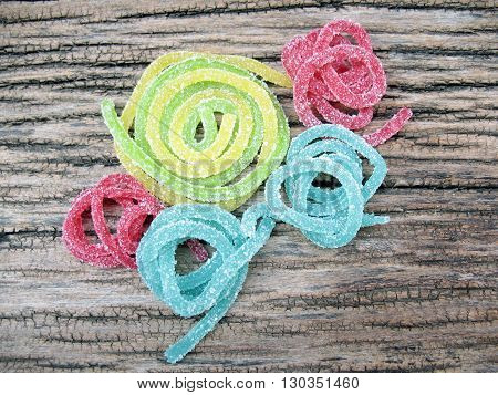 colorful of jelly and sugar on wooden top view