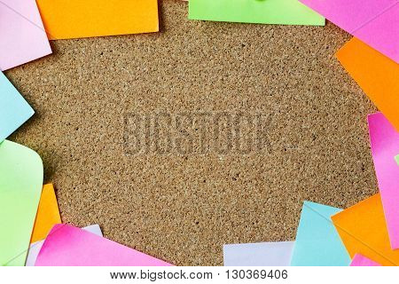 business, information, memo, management and education concept - close up of blank paper stickers on cork board