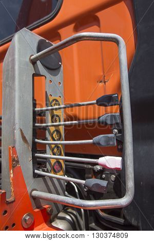 Mechanical levers of switching on control panel of lifting mechanism
