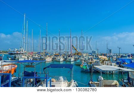 The marina of Acre with the scenic sailing yachts and small fishing boats Israel.