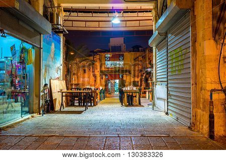 TEL AVIV ISRAEL - FEBBRUARY 25 2016: The cafe in old Jaffa located in the passage through the house on February 25 in Tel Aviv.