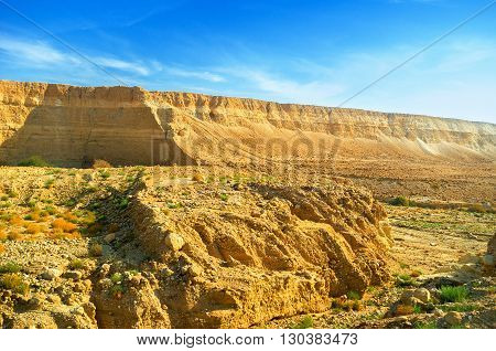 The unique landscape of Negev desert with the steep rocky slopes Israel.