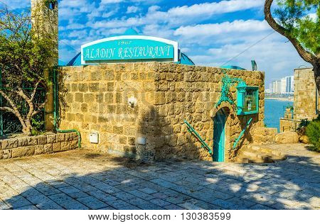 TEL AVIV ISRAEL - FEBBRUARY 25 2016: The beautiful restaurant of local cuisine located in the medieval stone building on the on February 25 in Tel Aviv.