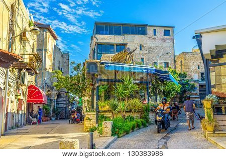 TEL AVIV ISRAEL - FEBBRUARY 25 2016: The old Jaffa is the best place to eat there are a lot of cozy cafes and nice restaurant offering the local cuisine and specializing on fish and seafood on February 25 in Tel Aviv.
