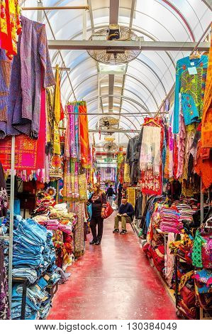 TEL AVIV ISRAEL - FEBBRUARY 25 2016: The covered clothes market in Jaffa with the wide range of different goods on February 25 in Tel Aviv.