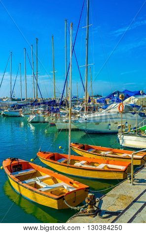 The beautiful orange boats in old Jaffa port Tel Aviv Israel.