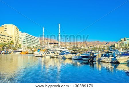 EILAT ISRAEL - FEBRUARY 23 2016: The resort is popular among the tourists and travelers all over the world so here are a lot of yachts from different countries on February 23 in Eilat.