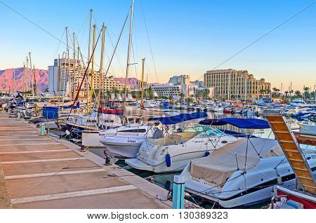 EILAT ISRAEL - FEBRUARY 23 2016: The marina located in the center of resort is one of the most tourist places on February 23 in Eilat.