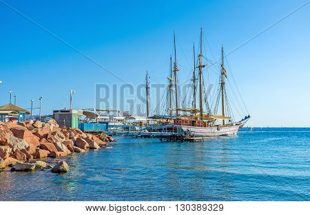 The wooden sailing ships are the most romantic sea transport for the trips along the scenic coast of Eilat Israel.