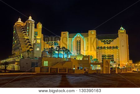 The city becomes completely unrecognizable in bright evening lights Eilat Israel.
