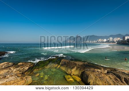 Rocks of Arpoador Beach and Ipanema Beach view in Rio de Janeiro, Brazil.