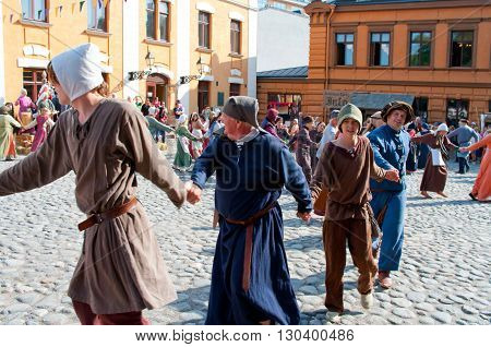 TURKU FINLAND 30 JUNE: The Medieval Market of Turku is historical reenactment event and includes a handicrafts market with participants garbed in period costumes on june 30 2013 in Turku Finland.
