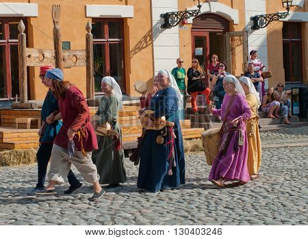 TURKU FINLAND 30 JUNE: The Medieval Market of Turku is historical reenactment event and includes a handicrafts market with participants garbed in period costumes on june 30 2013 in Turku Finland.