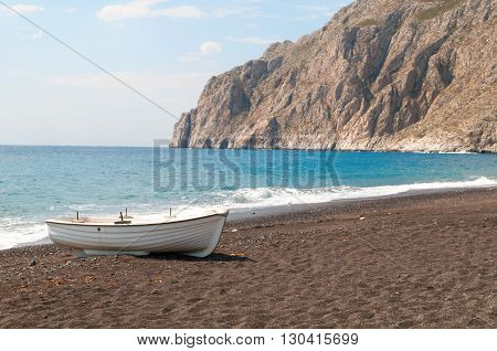 Black volcanic beach at Kamari Santorini Greece