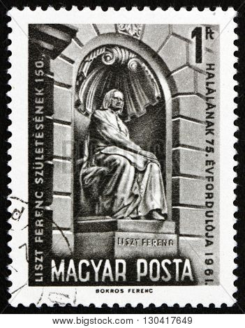 HUNGARY - CIRCA 1961: a stamp printed in Hungary shows Liszt Monument Budapest 150th Anniversary of the Birth and 74th Anniversary of the Death of Franz Liszt Composer circa 1961
