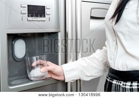 Refrigerator is making fresh clean ice cubes.
