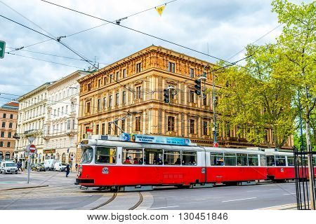 VIENNA, AUSTRIA - CIRCA APRIL 2016: Old red tram on the street in Vienna. Four wheel tram of Type L are still popular public transportation in Austria
