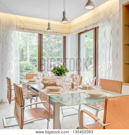 Vertical view of extravagant dinette prepared for a meal