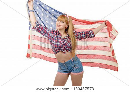 a sexy pin up girl holding an American flag.