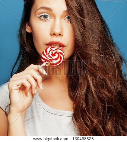 young pretty adorable woman with candy close up like doll makeup