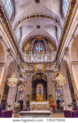 PARIS, FRANCE - MAY 31, 2015 Basilica Stained Glass Church Saint Louis En L'ile Paris France. Saint Louis En L'ile church built in Notre Dame was built in 1726 on the island in back of Nortre Dame.