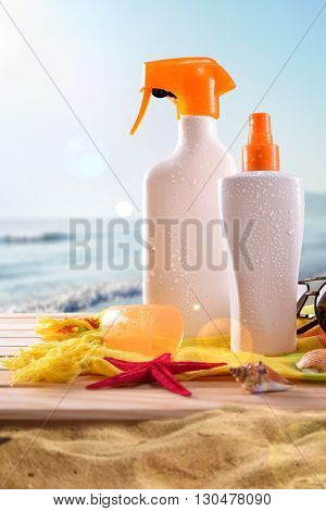 Suncream On Wooden Slats On The Beach Vertical Composition