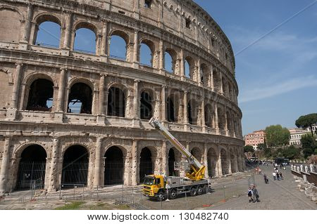 ROME ITALY - APRIL 7 : The Colosseum in Rome with restore works in progress on the facade. The Colosseum or Coliseum also known as the Flavian Amphitheatre in Rome Italy on April 7 2016.