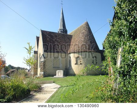 view on a church with a small french town