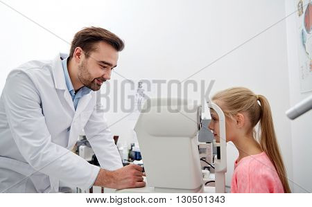health care, medicine, people, eyesight and technology concept - optometrist with non contact tonometer checking patient intraocular pressure at eye clinic or optics store