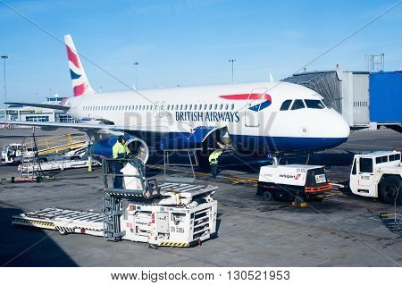 Dublin Ireland - 01 February 2015: British Airways passenger planes stand at their gates under dark skies at Dublin Airport Ireland