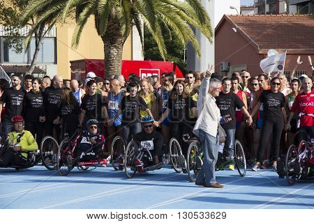 CAGLIARI, ITALY - November 2012, 4: 5 ^ Half Marathon - 4th memorial Delio Serra - a hand bike at the start Athletes