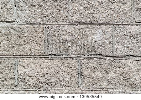 Grey Concrete block wall texture background closeup
