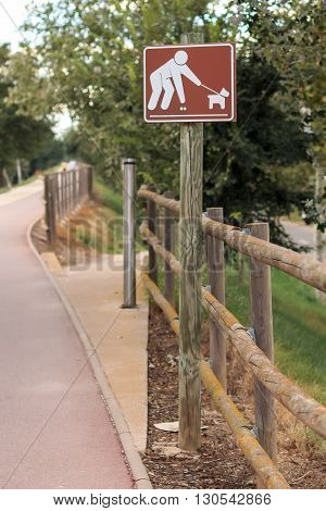Clean up after your pet road sign