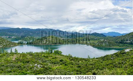 The lakes are part of a picturesque landscape and surrounded by mountains. They are situated between Makarska and Dubrovnik. It is a crypto-depression lake with its bottom below the surface of the sea.