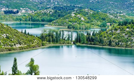 The lakes are part of a picturesque landscape and surrounded by mountains. They are situated between Makarska and Dubrovnik. It is a crypto-depression lake with its bottom below the surface of the sea.