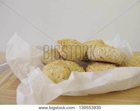 Homemade baking soda rolls on greaseproof paper