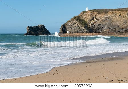 Portreath pier beach shore waves, Cornwall England.