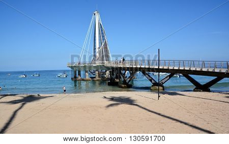 PUERTO VALLARTA MEXICO MAY 11 2016: Los Muertos pier designed by the winning architect of the Mexican Jose de Jesus Torres Vega, is one of centerpieces of an ambitious Downtown Puerto Vallarta renewal