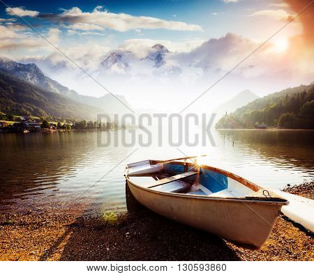 Fantastic views of the morning lake glowing by sunlight. Dramatic and picturesque scene. Location: resort Grundlsee, Liezen District of Styria, Austria, Alps. Europe. Beauty world. Instagram effect.