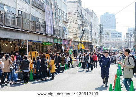 TOKYO, JAPAN -MARCH 29 2016: Street view at Tsukiji Market, Tsukiji market is a large market for fish, fruits and vegetables in central Tokyo, Japan. March 29 2016